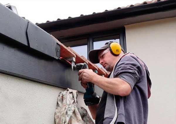 Operator repairing a dry verge