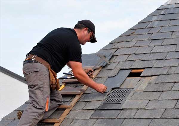 Operator fixing a roof leak