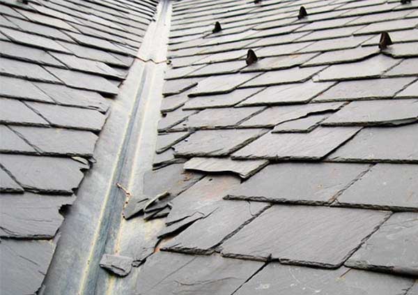 Damaged slates on a roof