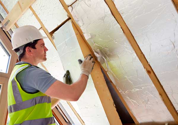 Operator Insulating an attic