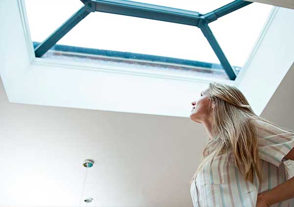 Woman staring a Skylight